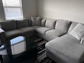 GRAY SECTIONAL COUCH WITH STORAGE