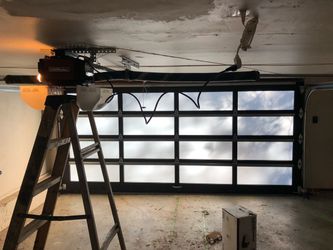 Garage Door Broken Spring Opener Off Track Replace Adjustment And Parts