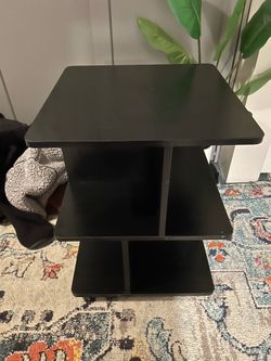 black night stand and lamp