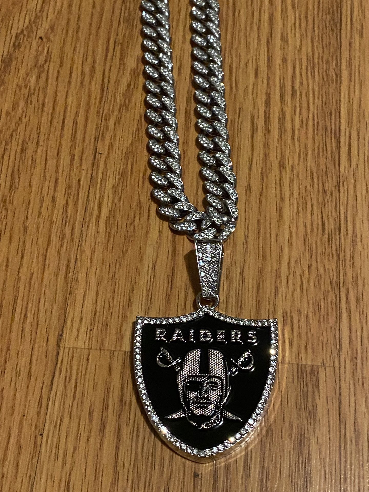 Brand New Raiders Pendant and chain sold as a set only  $60  last one in stock