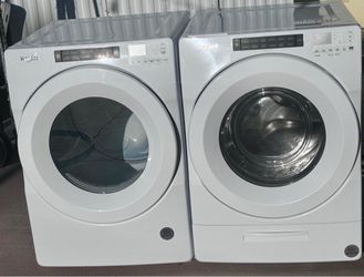 Whirlpool Front Load Washer and electric Dryer Set