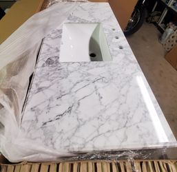 48 inch marble countertop and sink. With backsplash