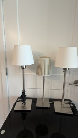 Three table/nightstand lamps