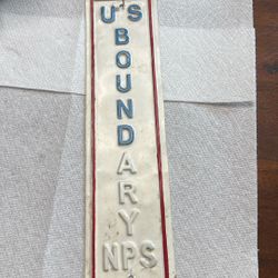 US Boundry Embossed Sign