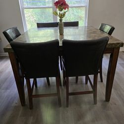 Granite Dining Table And Leather Chairs 