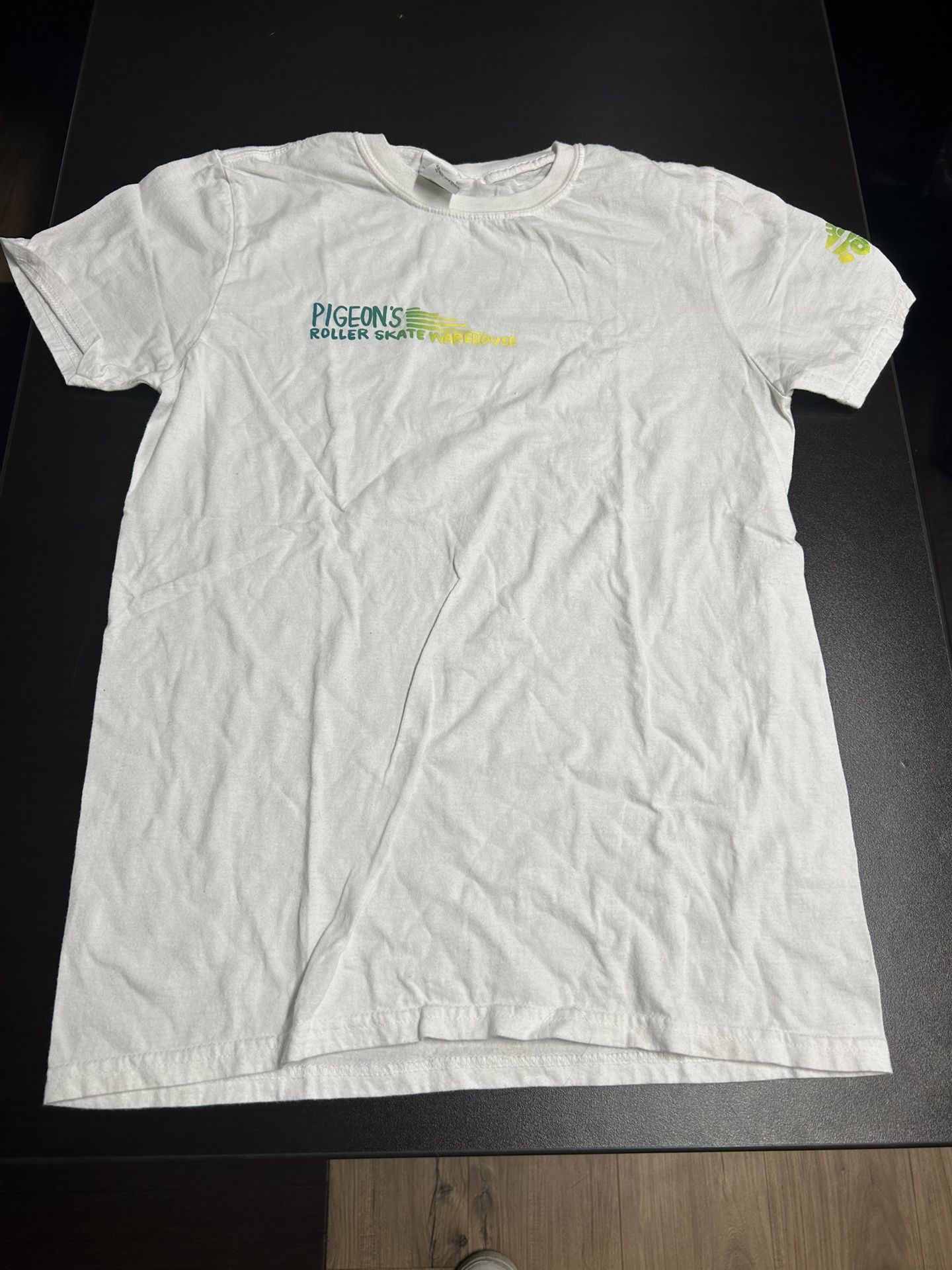 Pigeon’s Roller Skate Warehouse Unisex T-shirt Size Small White 100% Cotton