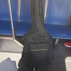 Electric guitar with cable and amp