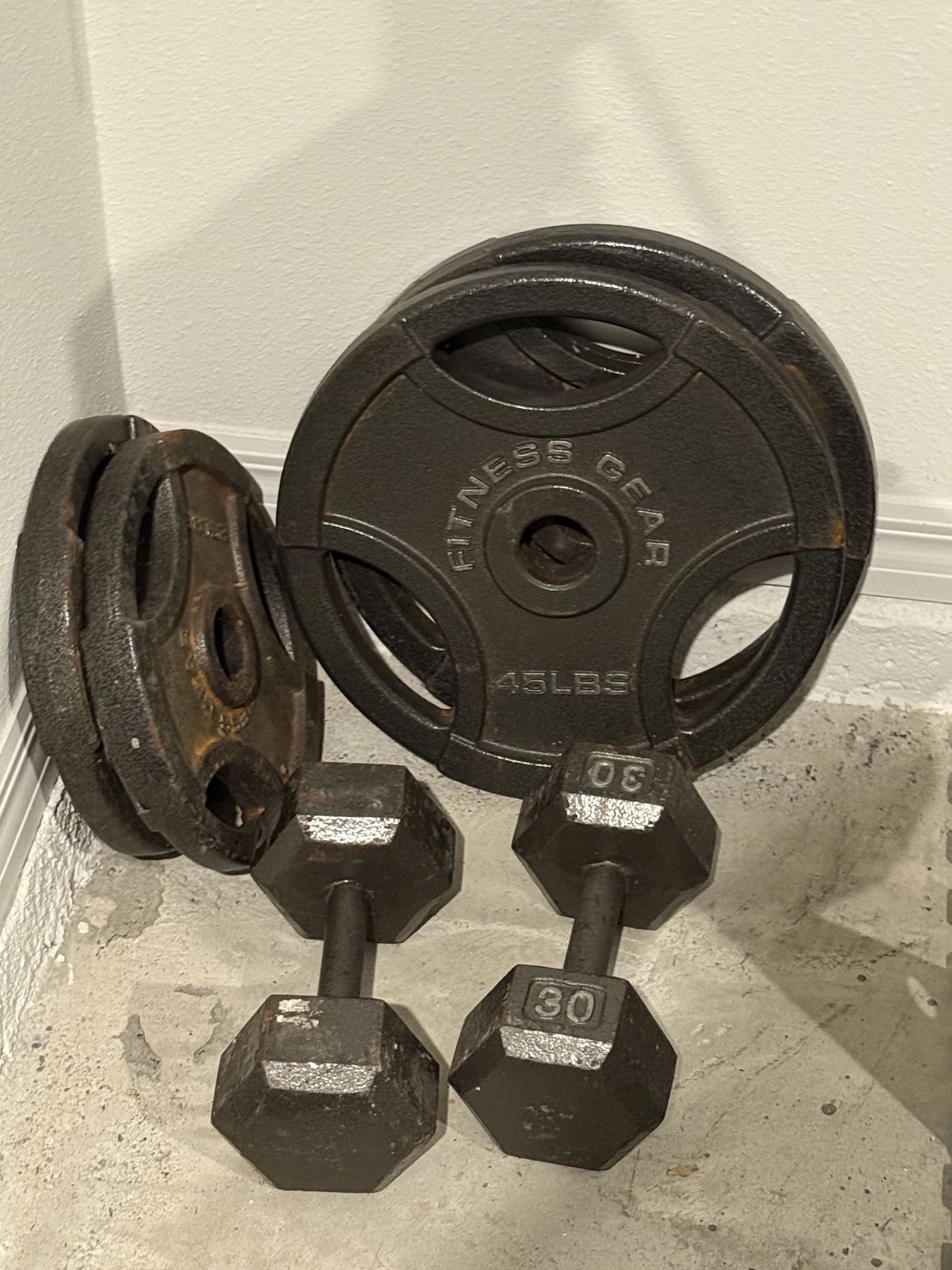 Olympic Weight Plates And Dumbbells