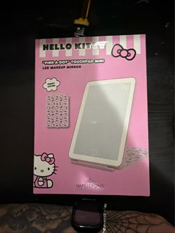 Impressions Vanity Hello Kitty touchpad mirror