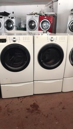 Kenmore washer and dryer w/pedestal and warranty