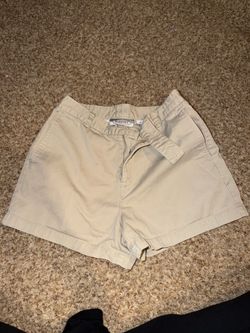 Old Navy shorts are designed in a classic chino style with a khaki beige color size 6. There is a tiny stain on front see pics