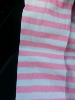 New girl pink n white ruffle leg warmers.