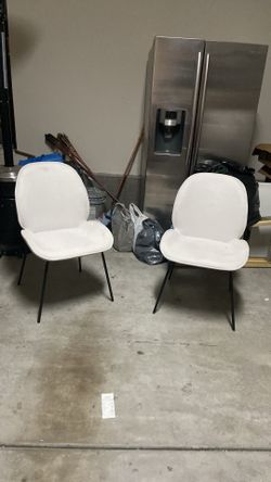Two living room chairs white