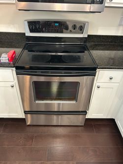Whirlpool stainless steel oven and Over-the-Range Microwave Stainless Steel