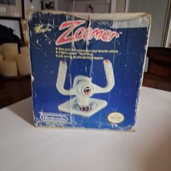This is a Beeshu Zoomer flight joystick controller for the Nintendo Entertainment System (NES). 