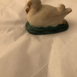 Antique duck figurine