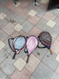 3 tennis rackets
