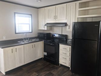 16-wide home only 1 year old!!! Can be financed!!!