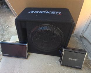Kicker set up 12 inch kicker in box 2 kicker amps 1  4 channel ND 1 2 channel