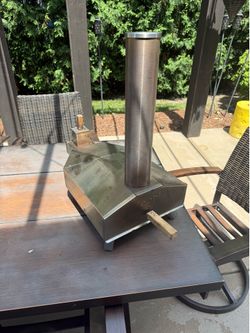 Ooni pellet  pizza oven with peel