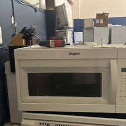 White whirlpool over the range microwave