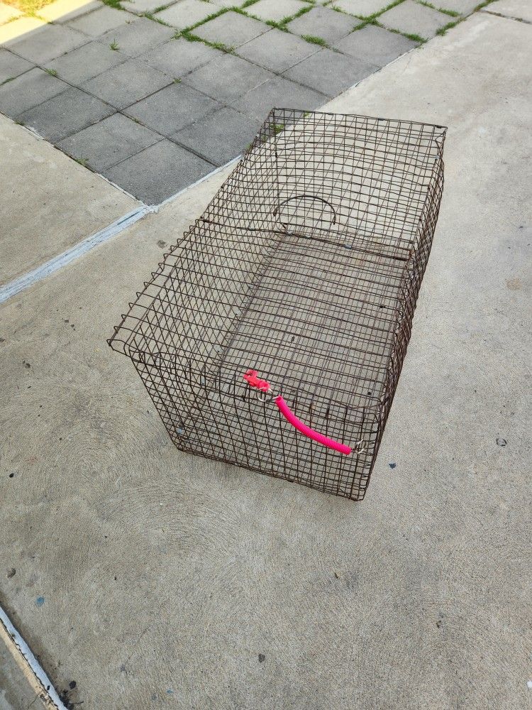 31 x 18 x 14" tall, mobile animal cage