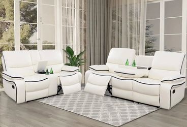 White leather fully reclining couch and love seat