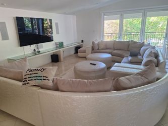 curved conversation sectional  Custom sofa set paid $8,000. Sale for $9000