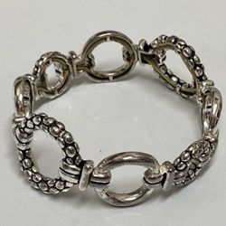 Napier, Silver Tone Textured Interlocking circle stretch bracelet