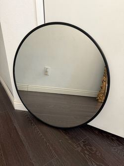 Black round mirror