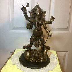 Lord Ganesha (14” tall) riding vanquished demon (asura )