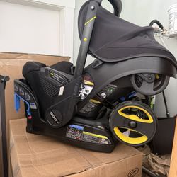 Doona Car Seat And Stroller 2-1. (Black Edition)