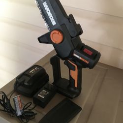 WORX PRUNING SAW/BATTERY CHARGER/BATTERY