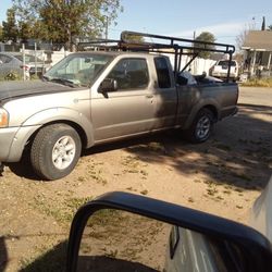 Nissan Frontier King Cab Xe W/Rack Brown