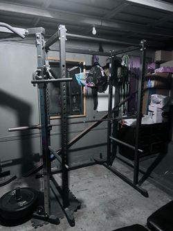 Squat rack, plate loaded multifunctional trainer, and flat bench