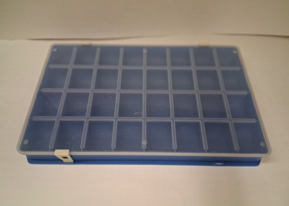 32 compartment divided storage container with snap on cover (1 clip is missing) $5 FIRMprice is firm
cash only
all sales final
fcfs
no holds
no refund