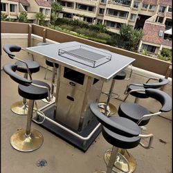 brand new outdoor fire pit table bar.   chairs Not included 