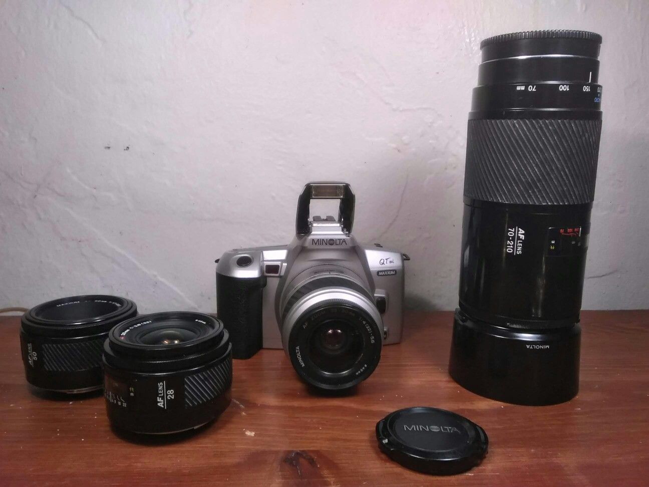 Minolta film cameras with. Exr. Lens. Macro 70-200 mm . 28 mm. & 50mm