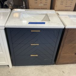 30” Bathroom Vanity in blue , single sink soft close solid wood with vanity top in white  $499  Luke’s liquidations warehouse Address:  2434 N Forsyth