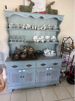 Beautiful cottage style kitchen hutch, table and 4 chairs