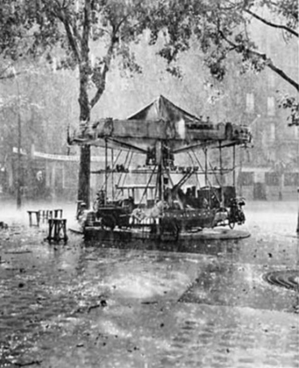 Pre-owned framed art print ROBERT DOISNEAU - Carousel In The Rain