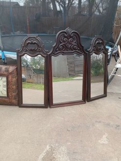 3 Big Mirrors And A Clock