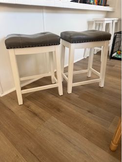 Grey and white bar stools