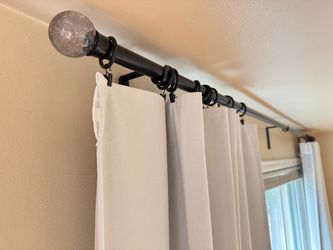 White blackout curtains + black rod, mounts and hanger clips