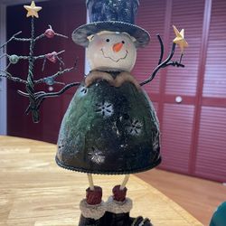 Snowman figurine with tea light holder in back
