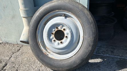 One 6 Lug 16x4 Inch Steel Wheel and Old tire, Original donut Spare
