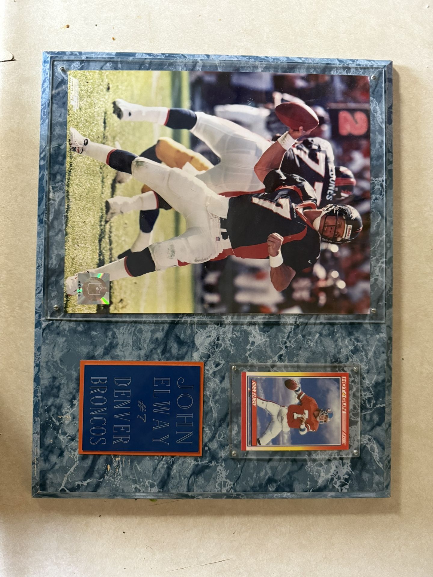 A 1990S John Elway Placard With A 1990S Hot Gun Score John Elway, Mint Condition Card And John Elway Photo