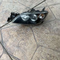 MAZDA 3 HEAD LIGHT