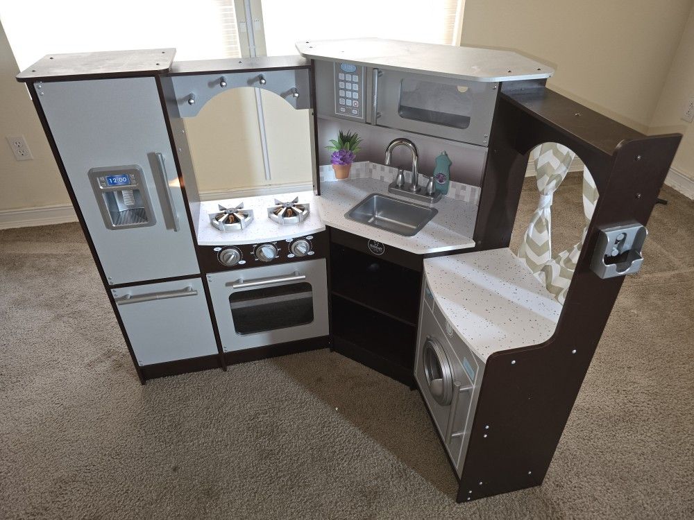 KidKraft Ultimate Corner Play Kitchen with Lights & Sounds.