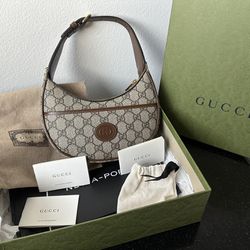 New Gucci HALF-MOON-SHAPED MINI BAG 